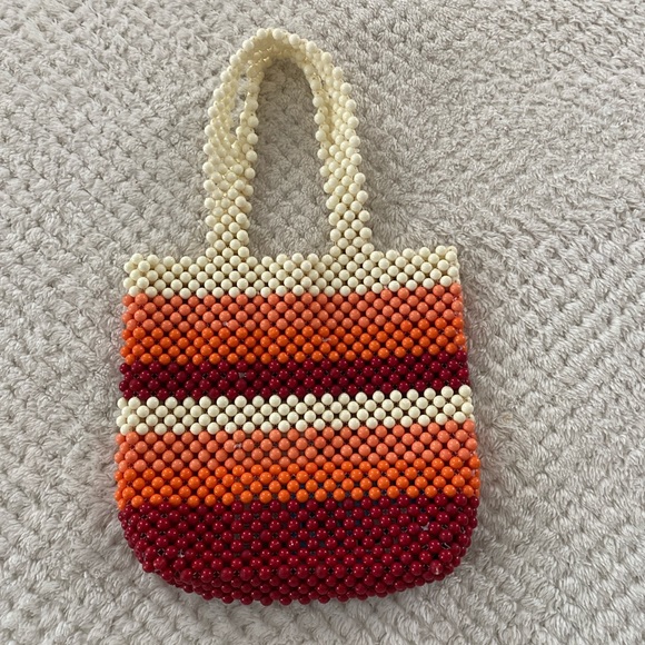 Urban Outfitters Handbags - Cute beaded urban outfitters small bag!Barely used